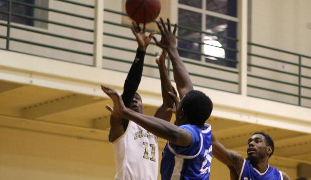 Men's Basketball Edges Regis in Triple Overtime Thriller