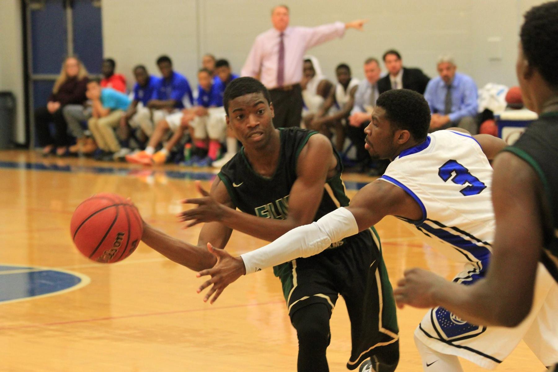 Men's Basketball Falls At Becker