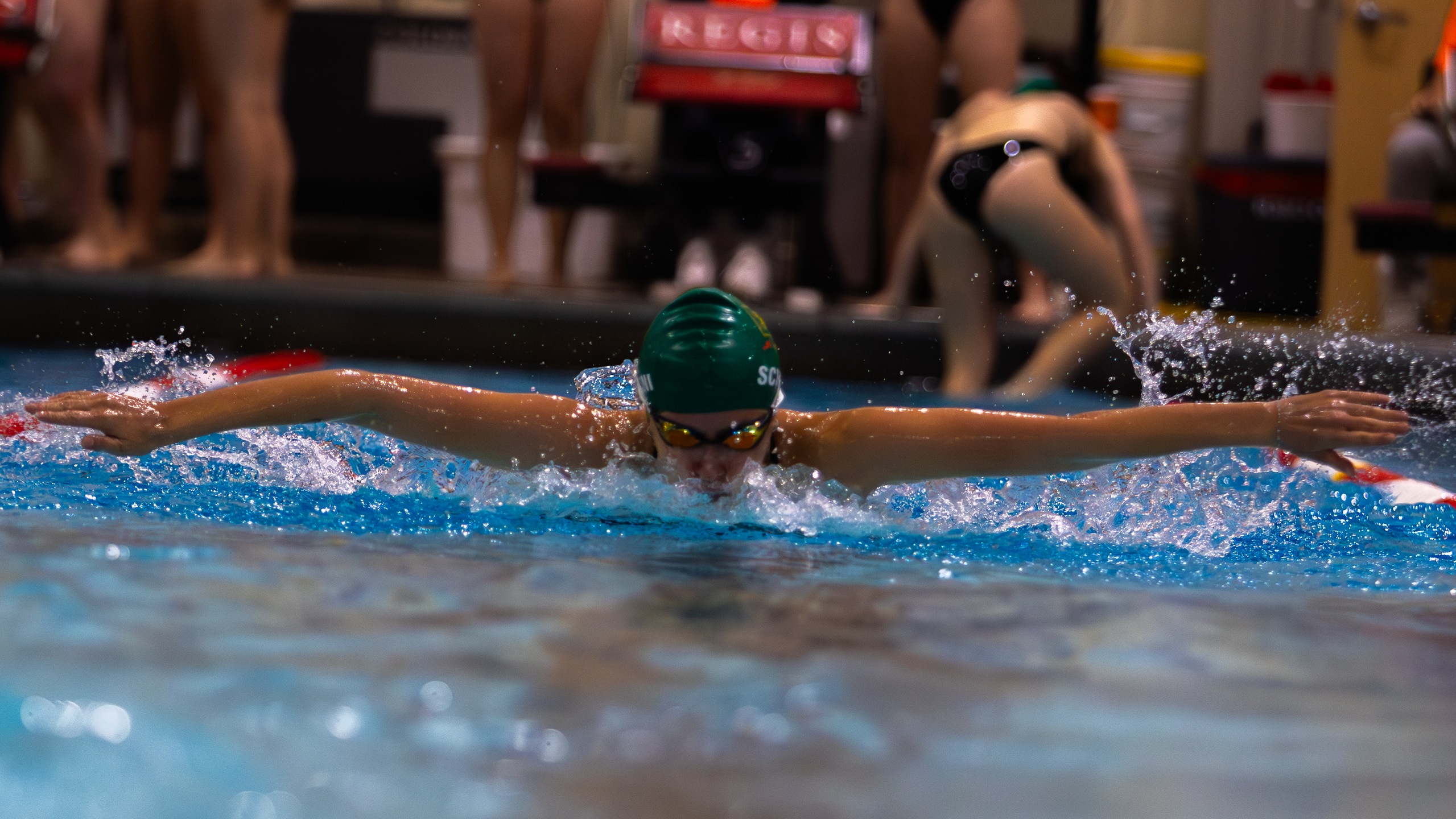 Swimming Competes in Quad Meet at Regis